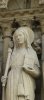 Portail de la Vierge : Statue de Sainte Geneviève tenant un cierge, le (…)